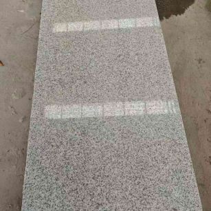 海口芝麻白光面毛板